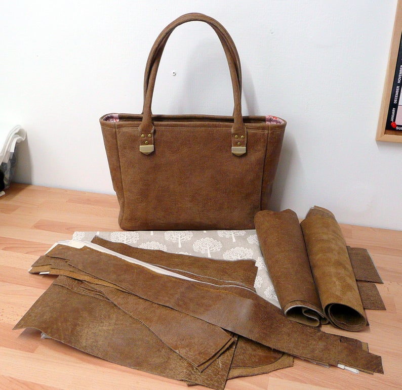 work in progress, from cutting pieces of leather to stitching the finished bag, its all done by me